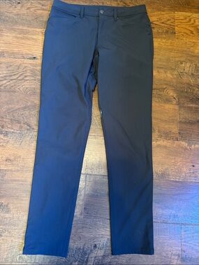 Lululemon ABC pants in size 32W 33L in dark gray.